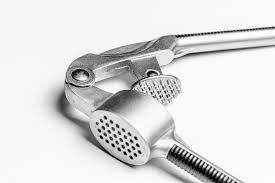 The Great Garlic Press Debate: Indispensable Kitchen Tool or Utterly Unnecessary? - Maria's Condo