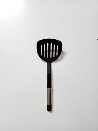 Unraveling The Mystery: Why Spatulas Have Holes - Maria's Condo